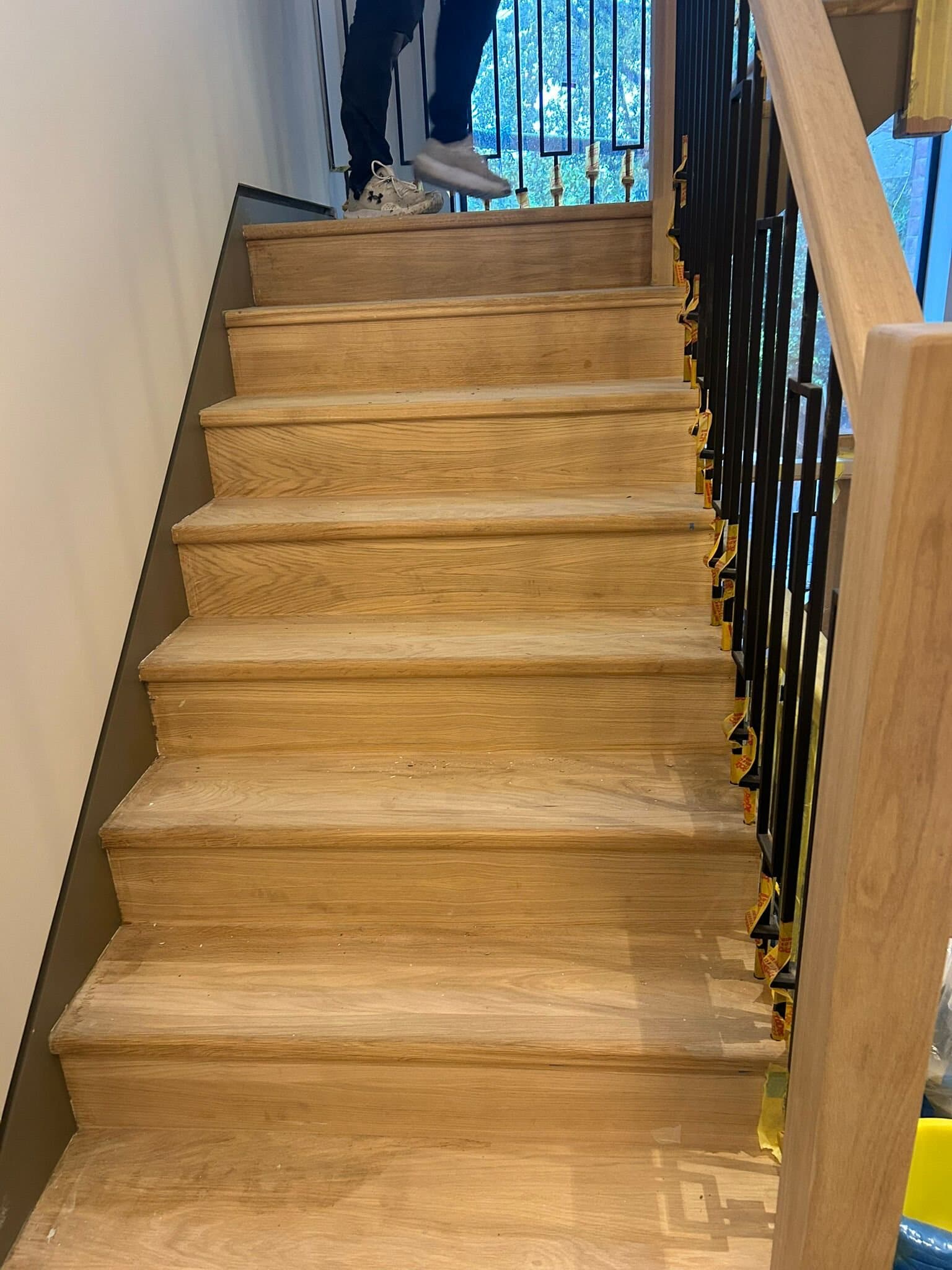 New oak staircase with black metal balustrade